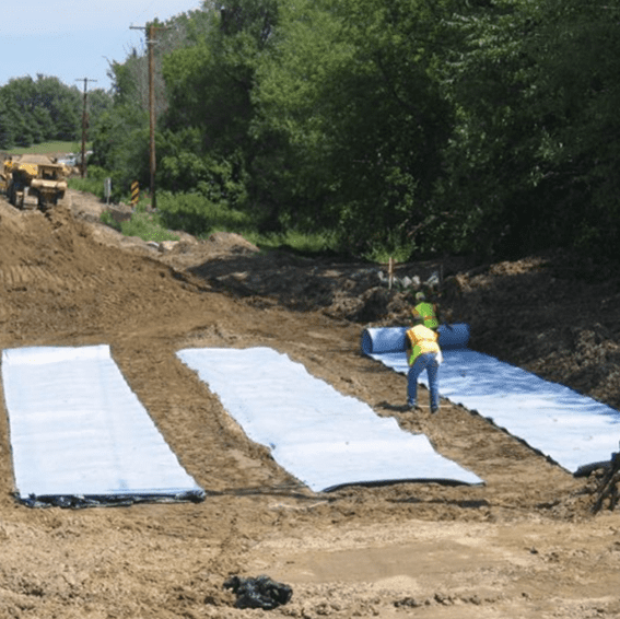 Reservoir dam reinforced non-woven geotextile